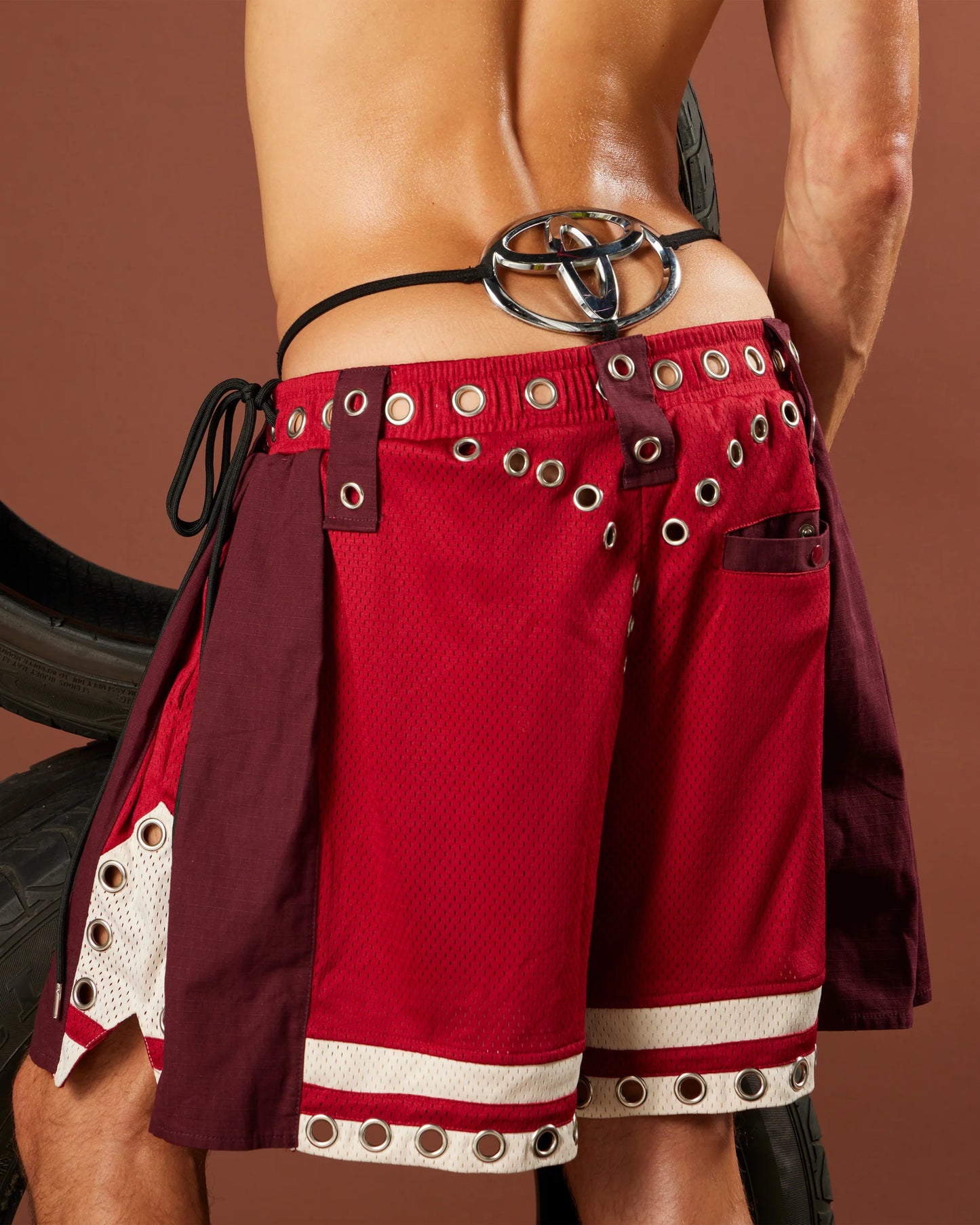 LEAK NYC - GROMMET TRACK SHORTS - MAGMA