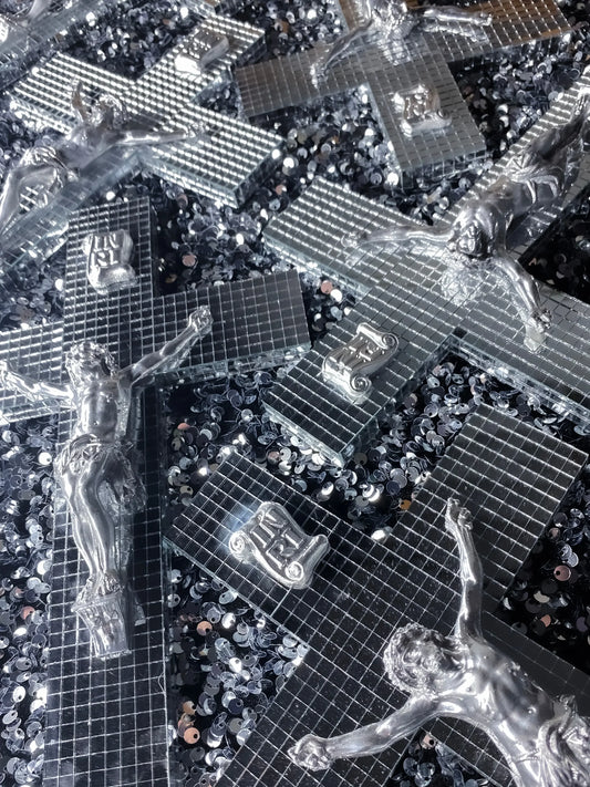 Mirror-faceted crucifix