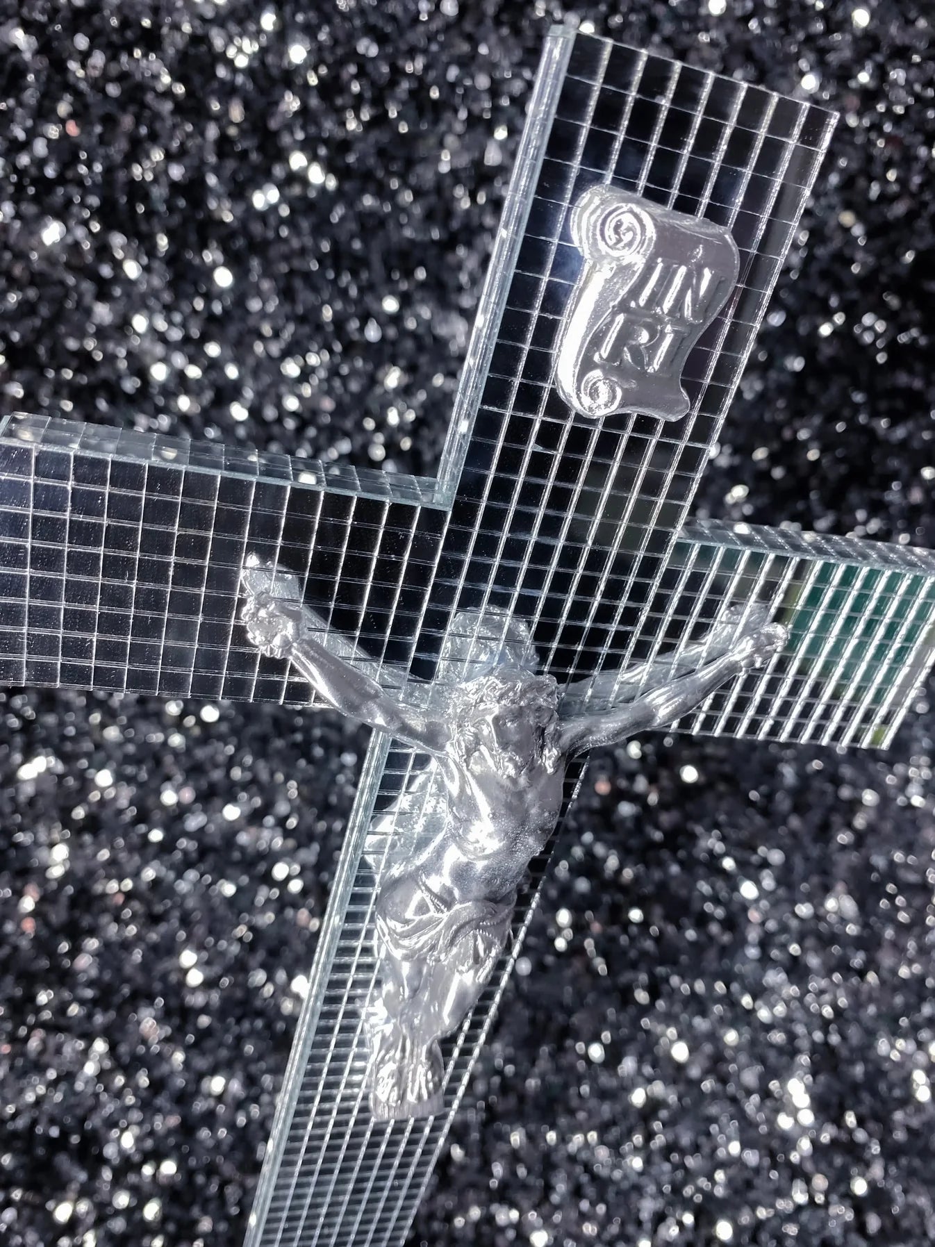 Mirror-faceted crucifix