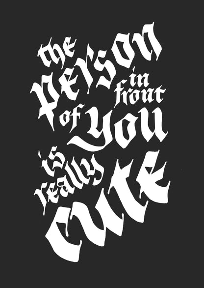 Big Iron-On Transfer "THE PERSON IN FRONT OF YOU IS REALLY CUTE" Black